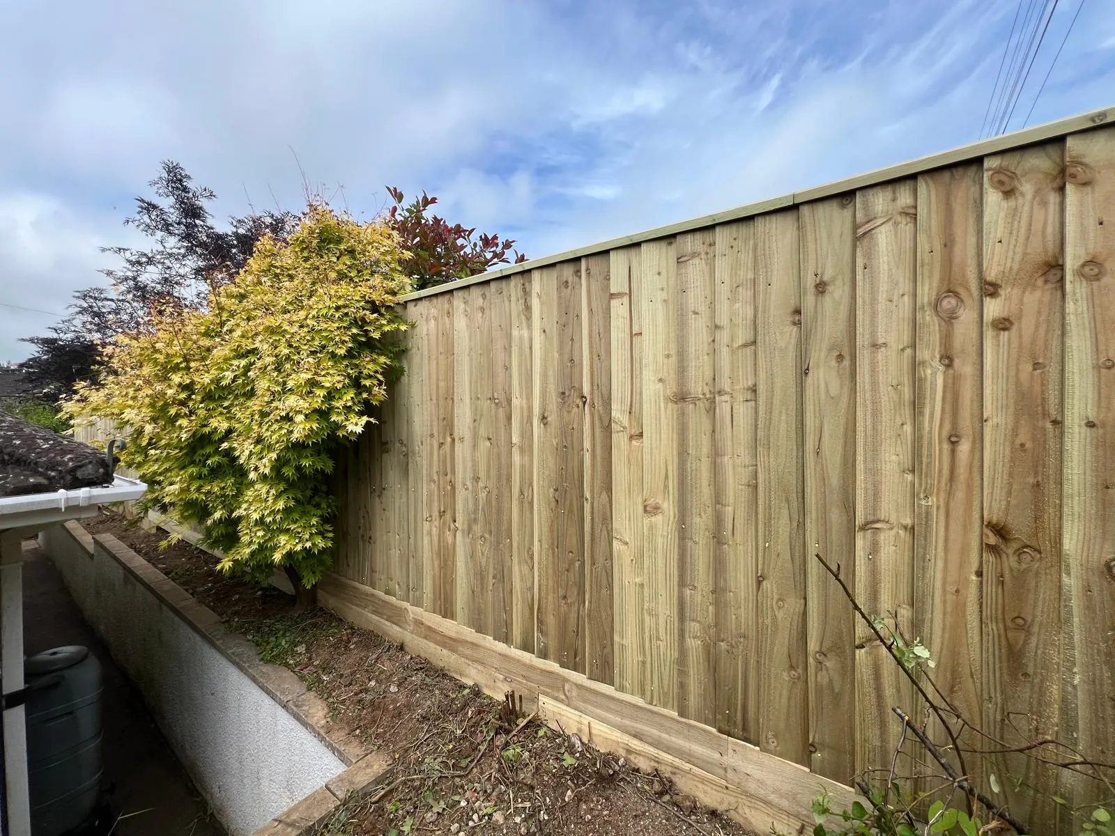 Closeboard Fence Installation on a Sloping Garden: A Torquay Case Study