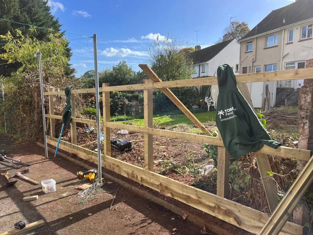 New timber posts, rails and gravel board going in for a 7m featherboard fence replacement in Torbay